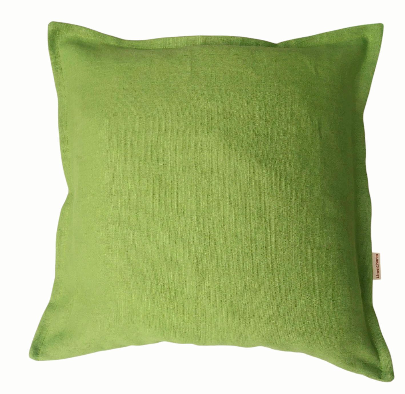 Decorative green linen pillowcase featuring a subtle flange trim and concealed zipper, ideal for living room styling.