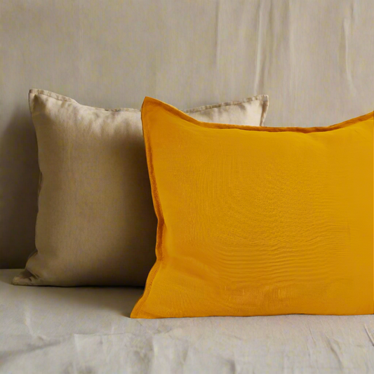 Mustard linen cushion cover with a hidden zipper, perfect for decorative throw pillows in any home decor style.