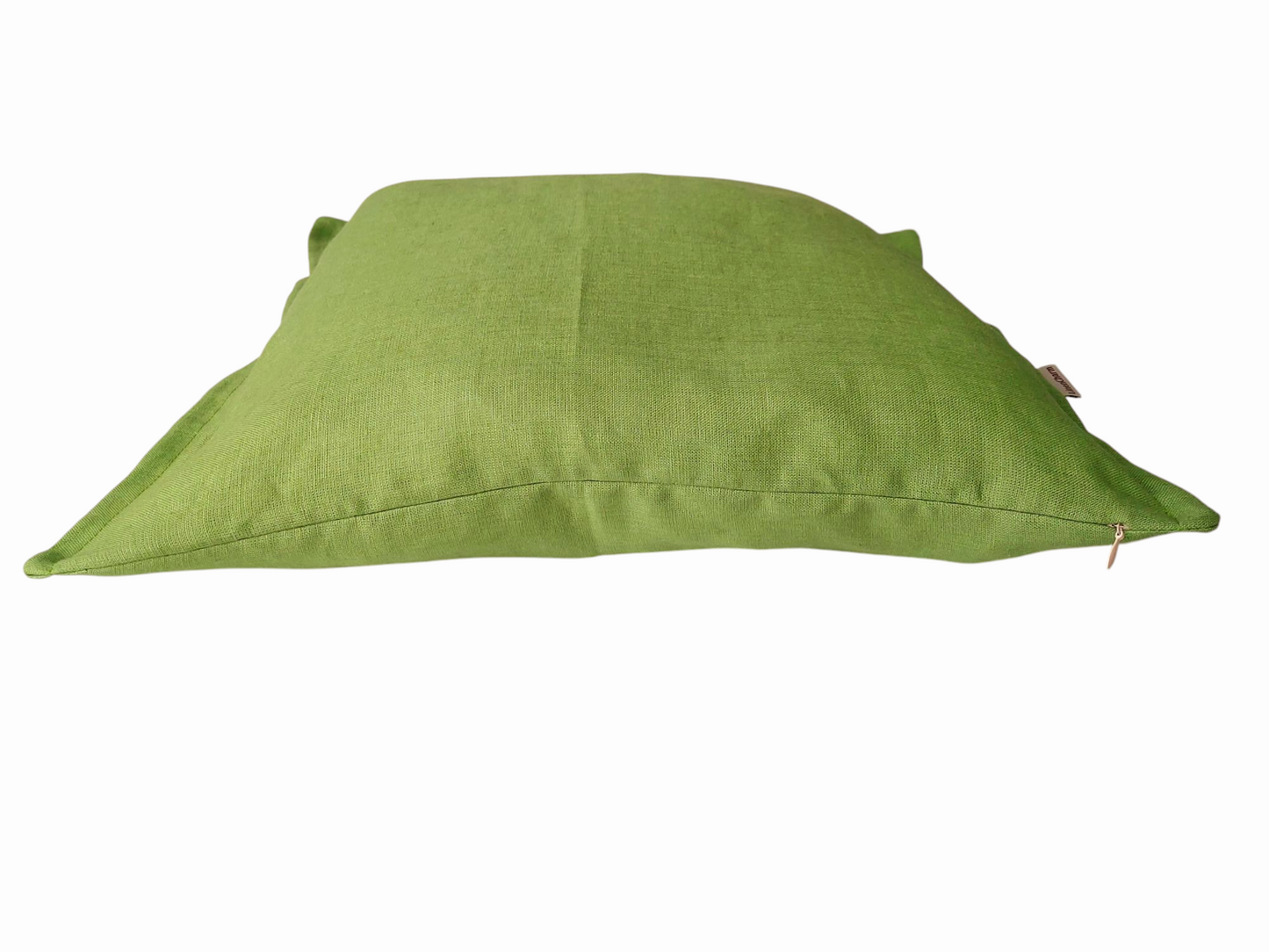 Soft and breathable linen throw pillow cover in fern green with an elegant flange edge and hidden zipper