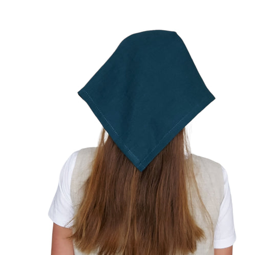 Model wearing petrol linen headscarf with natural linen texture