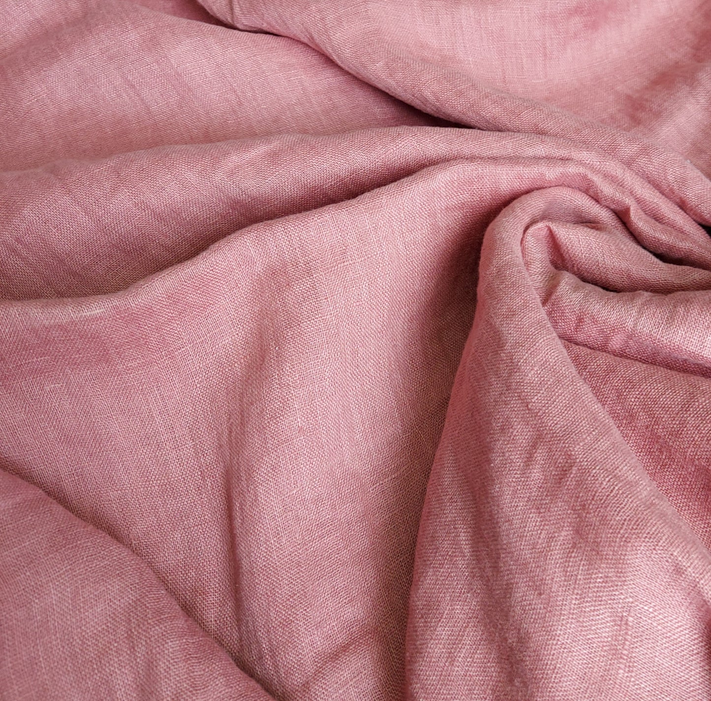Close-up of pink fabric with folds