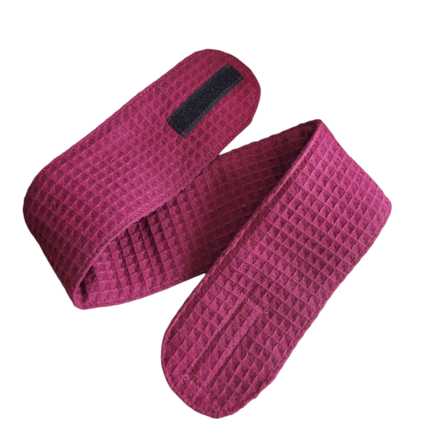 Pink textured belt on a white background