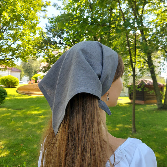 Model wearing gray linen headscarf with natural linen texture