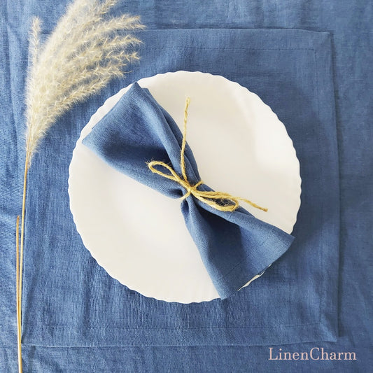 Flat lay of denim blue linen napkins – 100% linen handmade 205g/m²