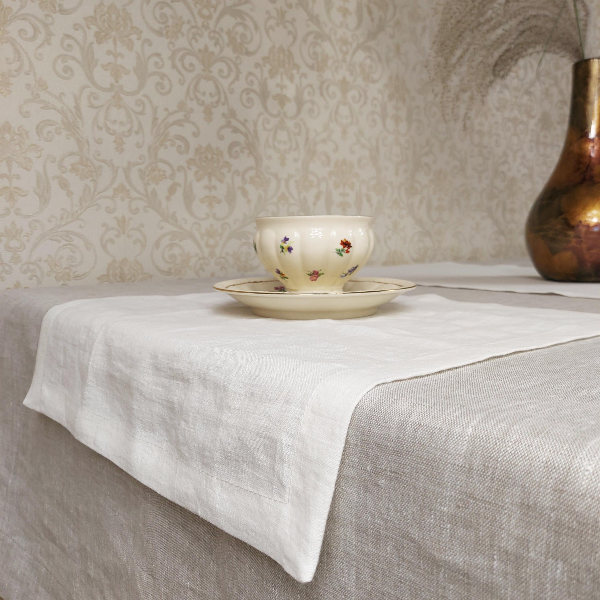 Close-up of soft ecru linen napkin texture – OEKO-TEX® certified