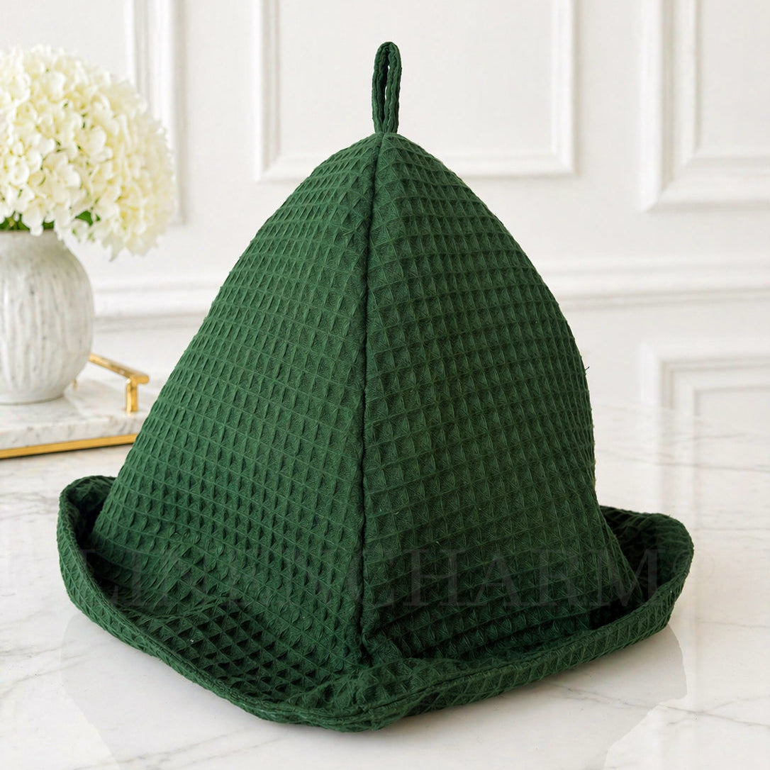 Bottle green sauna hat made from 100% waffle cotton, designed for head and hair protection during sauna sessions.