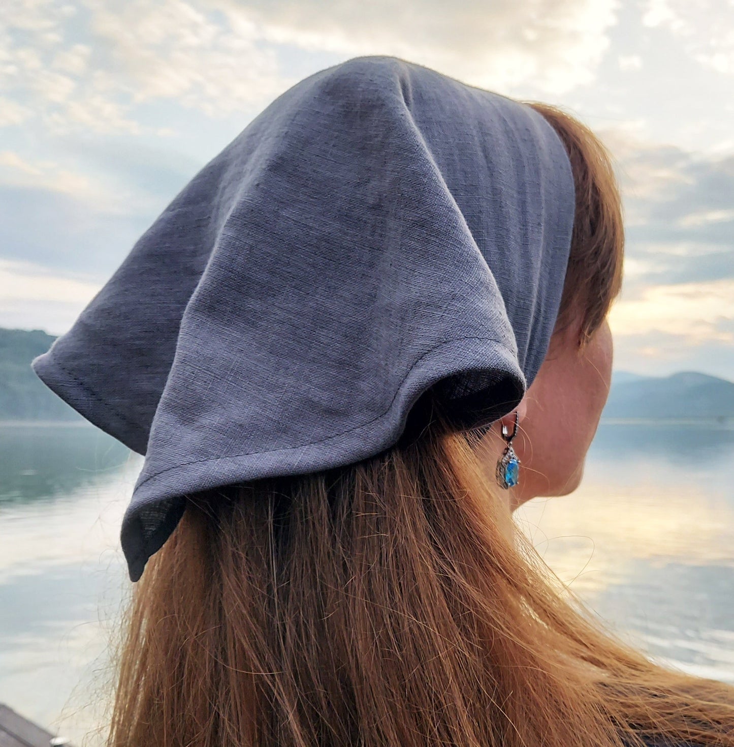 Woman wearing grey linen headscarf with elastic band
