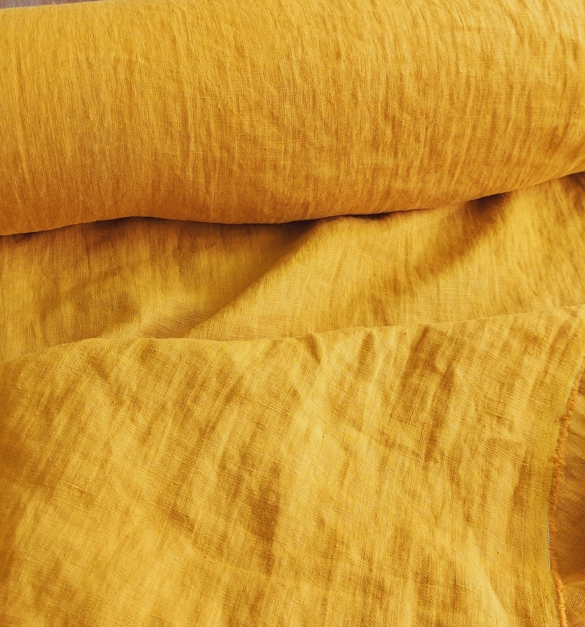 Decorative linen pillow cover in a warm mustard hue, crafted from 100% European Linen