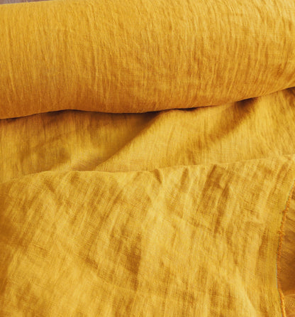 Decorative linen pillow cover in a warm mustard hue, crafted from 100% European Linen