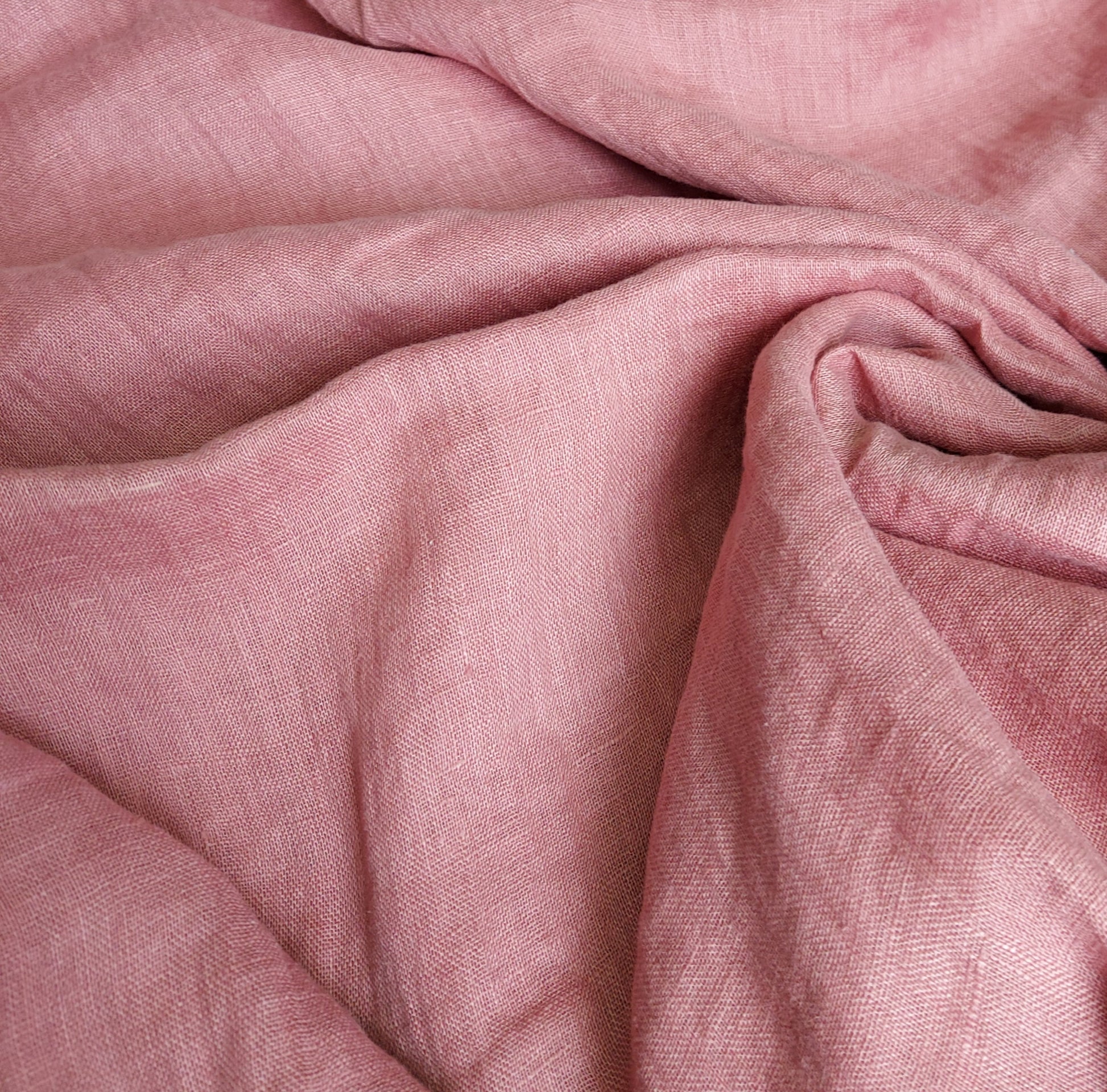 Close-up of pink fabric with folds