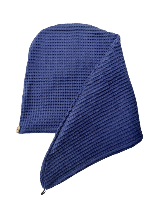 Blue textured towel on a white background