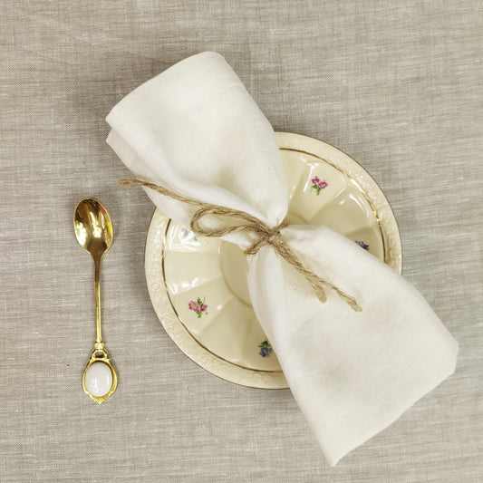 Ecru linen napkins, perfect for adding a touch of elegance to your dining table. Shop now for high-quality linen napkins in a natural and versatile color.