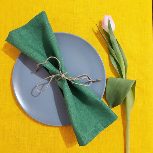 Flat lay of green heavy linen napkins – 250g/m², handmade, eco-friendly